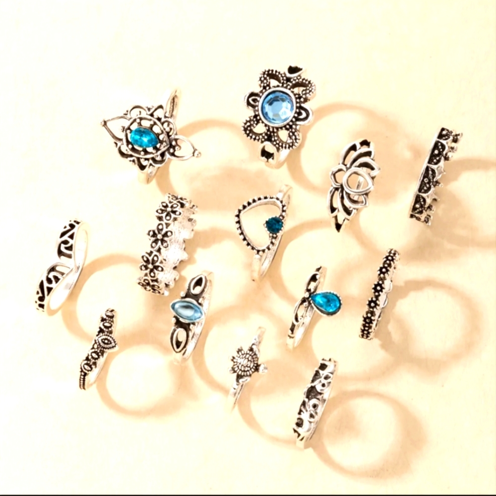 13 silvery assorted rings